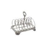 A George IV silver six division toast rack by Joseph Angell I