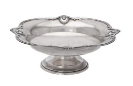 A silver shaped circular pedestal bowl by Elkington & Co.