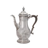 A George III silver baluster coffee pot, probably by Benjamin Gignac