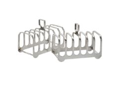 A pair of silver six division toast racks by Elkington & Co.