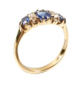 A sapphire and diamond seven stone ring