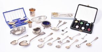 A collection of silver spoons and other items