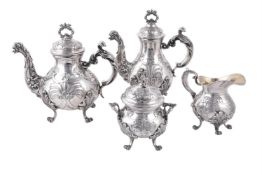 A matched silver coloured baluster tea and coffee service