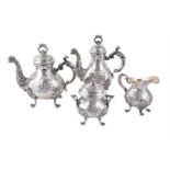 A matched silver coloured baluster tea and coffee service