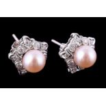 A pair of cultured pearl and diamond cluster earrings