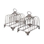 A pair of George IV silver rectangular toast racks by Samuel Whitford II or Samuel Wheatley