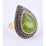 A diamond and peridot cluster ring