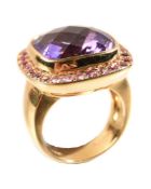 An amethyst and pink sapphire dress ring