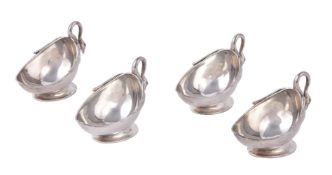A set of four silver oval salts by Goldsmiths & Silversmiths Co. Ltd.