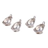 A set of four silver oval salts by Goldsmiths & Silversmiths Co. Ltd.