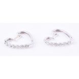 A pair of diamond heart shaped ear hoops