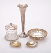 A collection of American silver coloured items