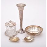 A collection of American silver coloured items