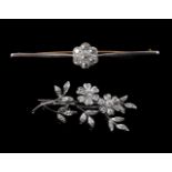 An early 20th century diamond cluster bar brooch