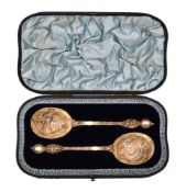 A cased pair of Victorian silver gilt spoons by Robert Stebbings