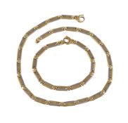 An 18 carat two colour gold necklace and bracelet