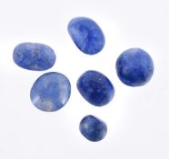 † Various unmounted cabochon sapphires