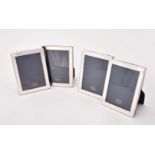 Four silver mounted rectangular photo frames by Kitney & Co.