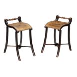 A pair of late Victorian ebonised Cellists' stools