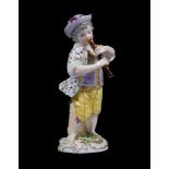 A Meissen figure of a boy playing the flute