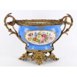 A French porcelain gilt metal mounted Sevres-style table centrepiece