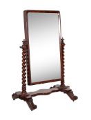 A Victorian mahogany cheval mirror