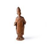 A South German sculpted softwood model of a Bishop Saint