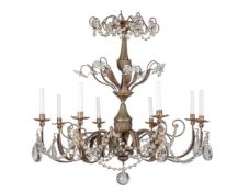 A patinated and glass eight light chandelier