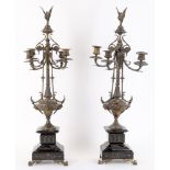 A pair of late 19th century ornate candlestick garnitures