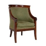 A mahogany and upholstered tub armchair in Empire style