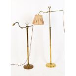 Two similar adjustable brass reading standard lamps