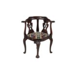 A Mid-18th century and later carved mahogany corner chair