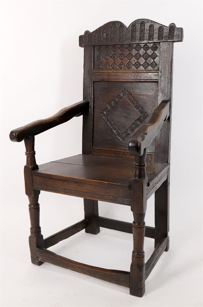 A 17th century and later oak 'wainscot' armchair