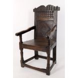 A 17th century and later oak 'wainscot' armchair