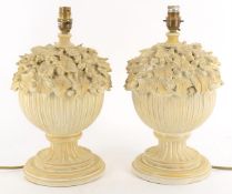 A pair of modern carved softwood lamp bases