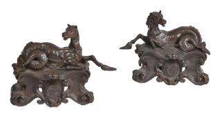 A pair of lacquered metal chenets