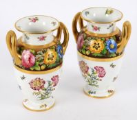 A pair of Spode Copeland's china two handled urns