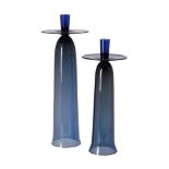 λ Two graduated glass tall candlesticks by Anna Torfs