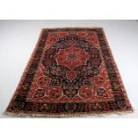 Three rugs including a Tabriz pattern North West Persian rug