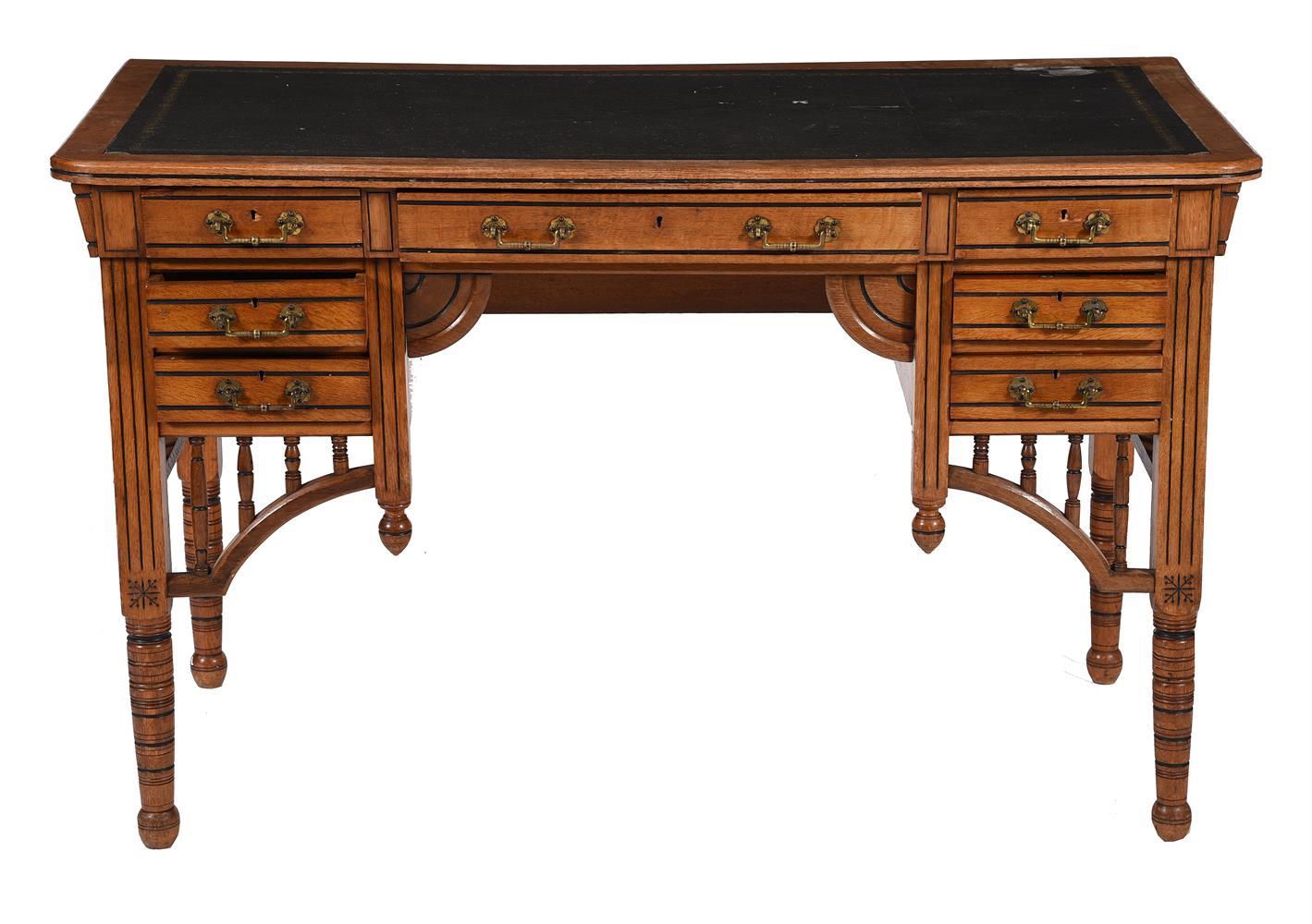 Late Victorian oak and part ebonised Aesthetic movement desk