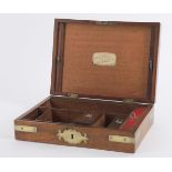 Lund - An early 19th century mahogany and brass bound dressing case