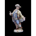 A Meissen (punkt) figure of a man with a cane