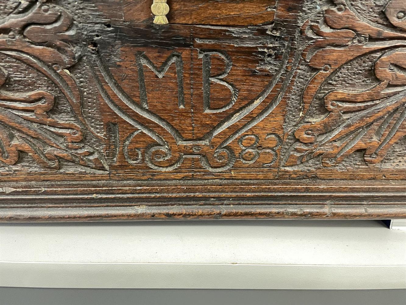 A 17th century and later oak box with carved decoration - Image 10 of 10