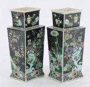 A pair of Chinese Famille Noire vases