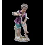 A Meissen figure of a young gardener