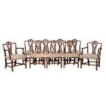 A set of nine George III mahogany and upholstered dining chairs