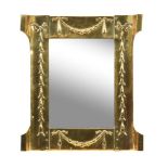 An Art Nouveau brass framed wall mirror