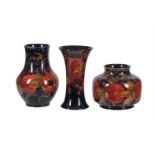 'Pomegranate' three Moorcroft pottery vases