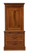 An Edwardian mahogany banded and inlaid shoe cabinet