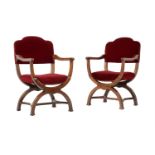 A pair of walnut and red velvet upholstered armchairs